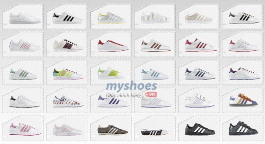 Cận cảnh phần gót giày Adidas Superstar màu trắng với logo cỏ ba lá trên nền xanh, thể hiện chi tiết độc đáo