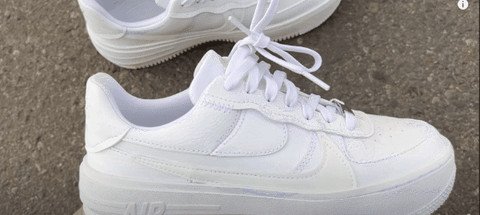 Chi tiết giày Nike Air Force 1 trắng cho nữ với các lỗ thoáng khí