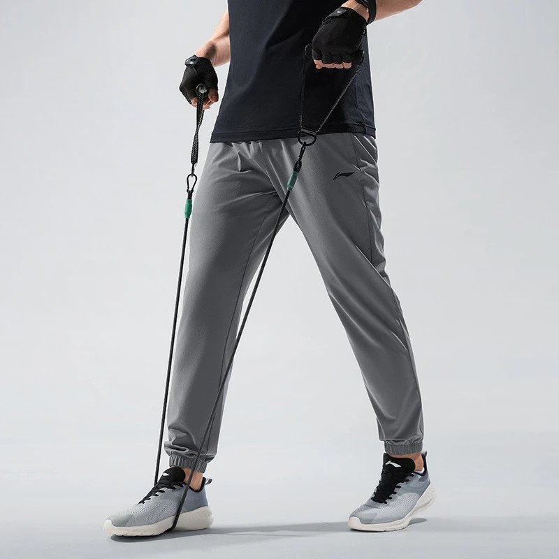 Quần gió nam Li-ning AYKU461-2V với công nghệ AT DRY ULTRA