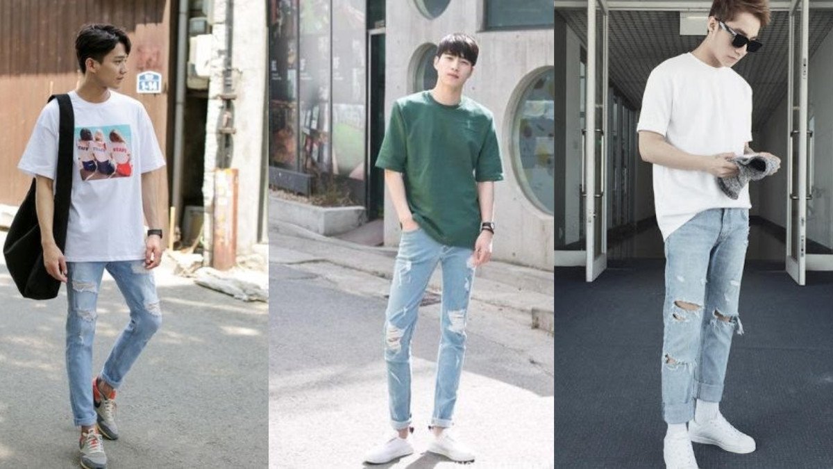Chàng trai mặc áo phông trắng, quần jean rách và giày sneaker xanh