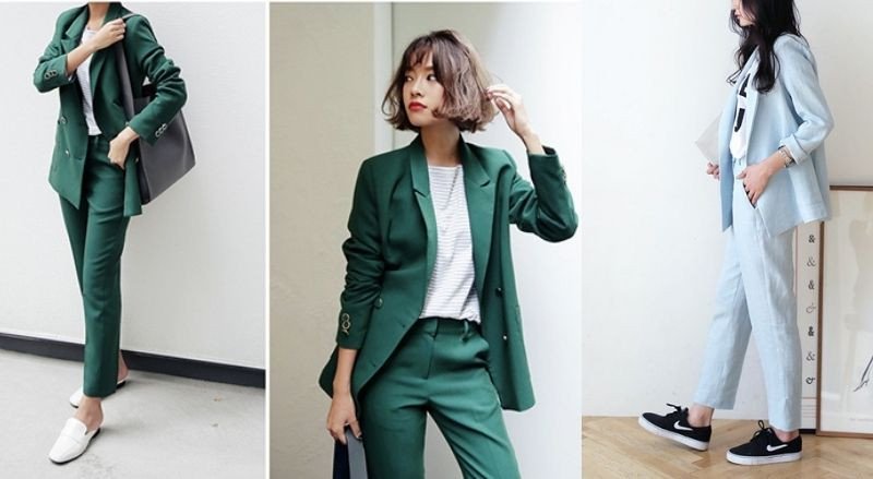 Cô gái mặc vest xanh đậm và quần âu, phối với giày cao gót nude