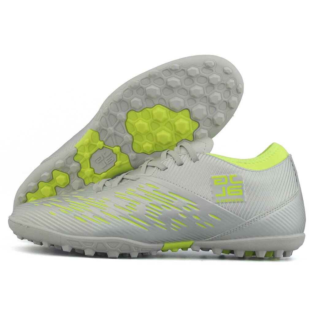 Đế giày đá bóng AG với nhiều đinh nhỏ, tròn, tối ưu hóa cho sân cỏ nhân tạo