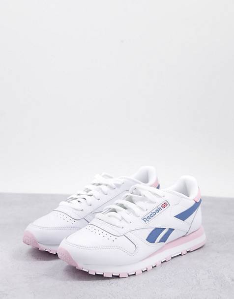 Đôi giày Reebok Classic trắng với thiết kế xoắn ốc độc đáo, một mẫu giày thể thao Reebok chính hãng biểu tượng.