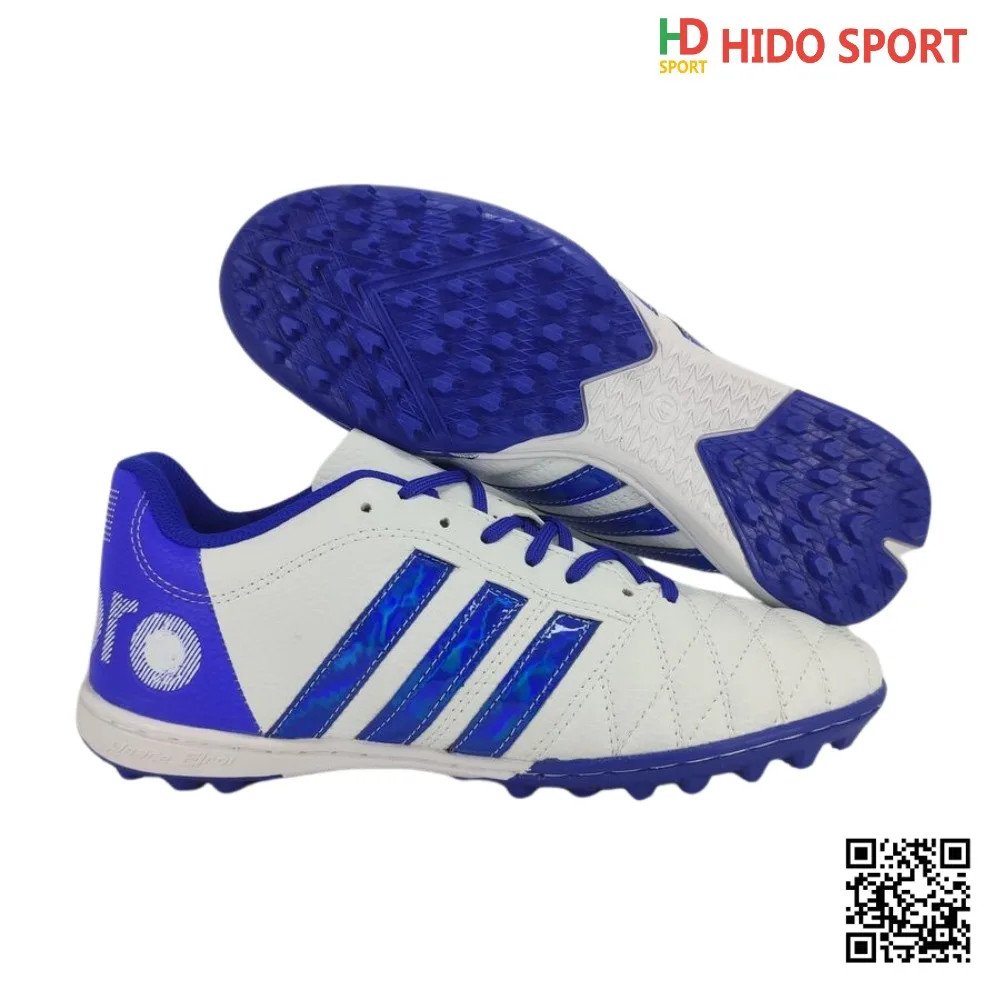 Giày bóng đá Toni 11 Pro phối màu xanh bích nổi bật trên sân