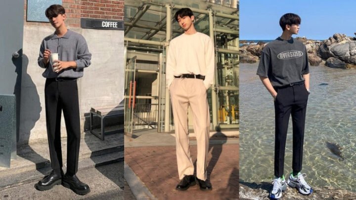 Người mẫu nam mặc quần tây ống ôm màu xanh phối cùng áo sơ mi trắng