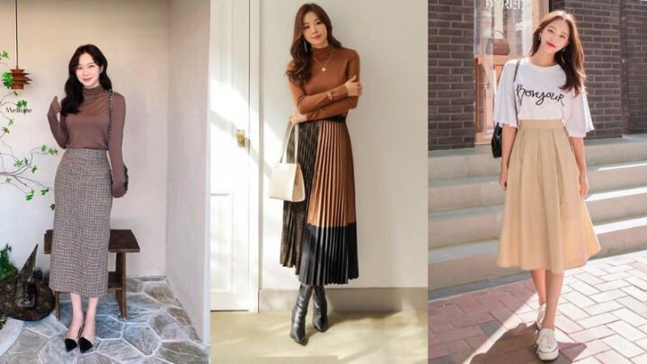 Người phụ nữ mặc váy dài và giày thể thao đang sải bước trên phố, thể hiện phong cách thời trang năng động và tự tin